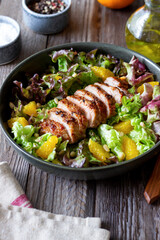 Salad with duck, oranges and nuts. Healthy eating. Diet.