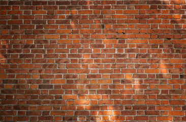 Wall of an old red brick house