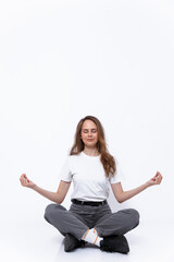 Obraz premium girl with brown hair in a white T-shirt and gray jeans