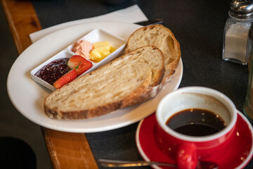 toast and strawberry jam with coffee