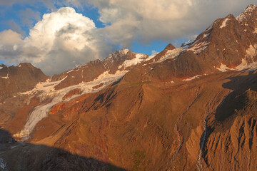 Sunset on the moraines of the Vallelunga - Langtaufer glacier, Alto Adige - Sudtirol, Italy. Popular climbers and travel destination