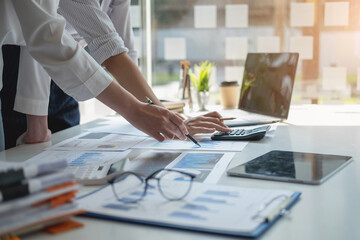 Marketing, Financial, Accounting, Planning, Casual meeting of smiling diverse business team analyzing financial data, Planning Concept.