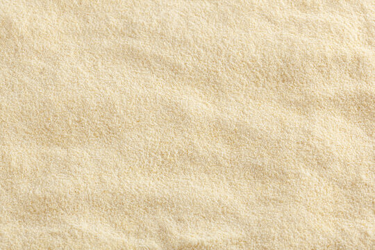 Uncooked semolina flour background