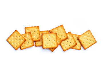 Dry cracker cookies on white background.