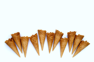 Empty ice cream cone on white background.