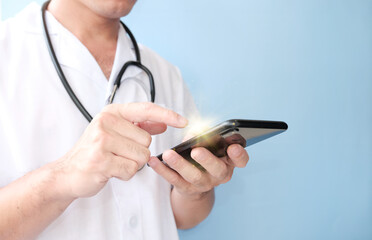 Doctor using mobile smartphone, Medicine doctor with stethoscope.
