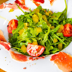 Rocket salad with dried Spanish ham