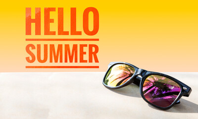 Hello Summer banner on blue background with sunglasses, summer season concept background