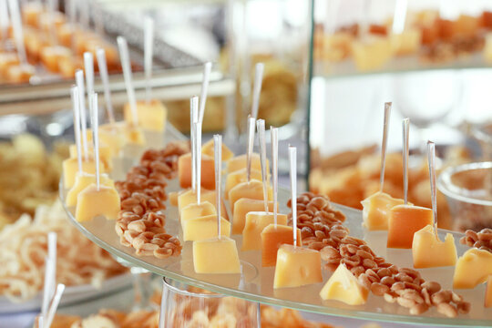 Reception table with the cheese plate and the grapes