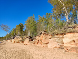 Veczemju Klintis, Veczemju Cliffs on Baltic Sea Near Tuja, Latvia. Beautiful Sea Shore With Limestone and Sand Caves. Calm, Relaxing, Meditation Nature. Concept of Romantic Evening and Holidays