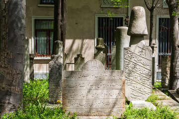 Istanbul, Turkey - April, 2022: The dervish tombstones in the cemetery of Galata Mevlevihane Museum...