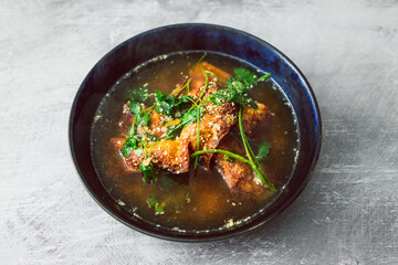 healthy plant-based food, vegan wonton dumpling soup with spicy broth