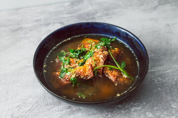 healthy plant-based food, vegan wonton dumpling soup with spicy broth