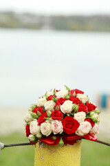 top view of luxury bouquet of red and white flowers top view with red bow on wedding day holiday