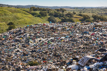 Open air garbage dump. Plastic waste pollution. Global warming. Climate