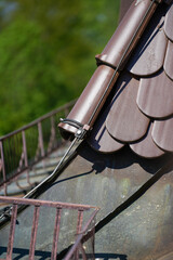 Detail view of a roof with lightning rod - obrazy, fototapety, plakaty