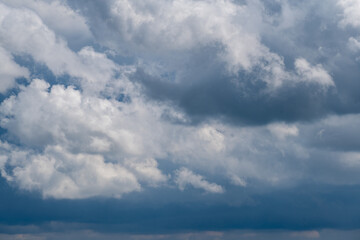 Fototapeta na wymiar Blue and white chic storm clouds