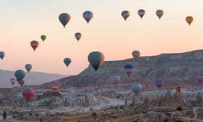 Foto auf Acrylglas Hot air balloon flying over spectacular Cappadocia © muratart