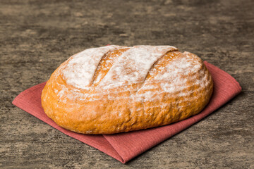 Fresh homemade crisp bread on napkin, top view. Healthy unleavened bread. French bread. Top view Bakery products