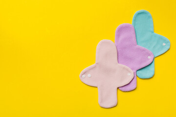 Eco-friendly reusable fabric women's pads. set of colorful bright reusable menstrual pads. zero waste woman periods concept top view with copy space