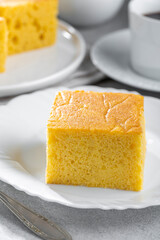 Sliced ​​cornmeal cake on the table.