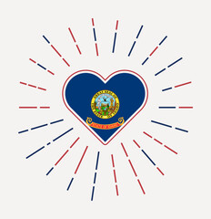 Idaho heart with flag of the US state. Sunburst around Idaho heart sign. Vector illustration.