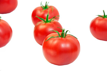 ripe tomatoes on a white background. the concept of cooking tomato sauce. red vegetables on a light texture. juicy pink tomatoes on the table