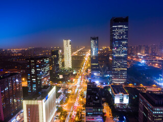 Aerial photography night view of modern buildings in Suzhou city, China