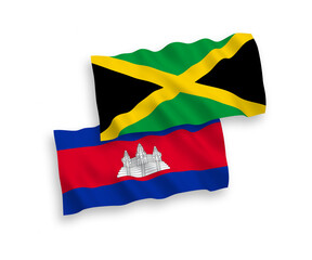 National vector fabric wave flags of Kingdom of Cambodia and Jamaica isolated on white background. 1 to 2 proportion.