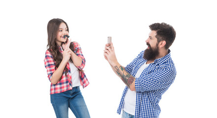 Happy fathers day to my dad. Bearded man take photo of girl with fake mustache. Fathers day