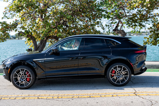 Miami Beach, Florida USA - April 15, 2021: black aston martin dbx, side view