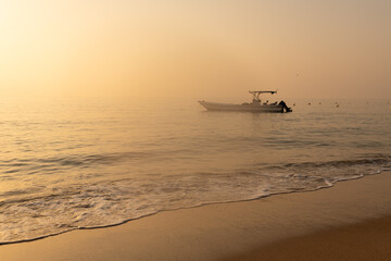 Fishing boat anchored close to shore