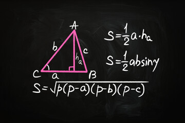 Basic triangle area formulas written on chalkboard - obrazy, fototapety, plakaty