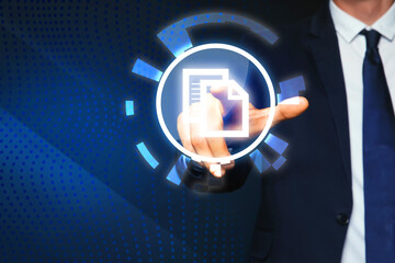 Man pointing at virtual icon of computer file on dark blue background, closeup