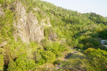 Fototapeta na wymiar Okuta Dam and lakeside mountains in Sendai, Miyagi, Japan - 日本 宮城県 大倉ダム