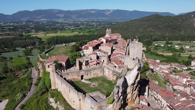 aerial orbital shot of the ruins of an old medieval castle in Fr&iacute;as, Burgos, spain