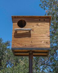 A Barn owl nesting box installed on a long pole at Lake Cachuma, Santa Barbara county, CA.