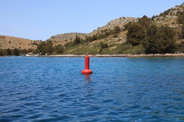Red navigation buoy in Croatia