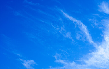 Fototapeta na wymiar Clear blue sky with white clouds. Beautiful nature background.