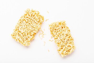 Raw instant noodles on white background.