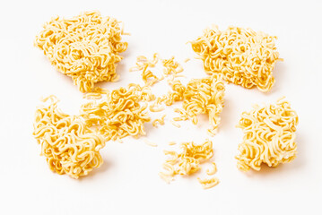 Raw instant noodles on white background.