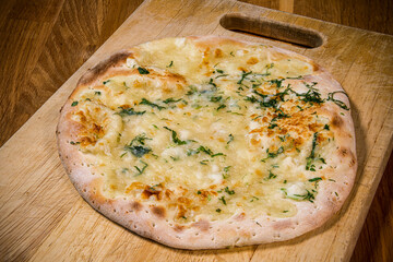 Plain tasty cheese and baked tasty manakish dough, arabic cuisine and food