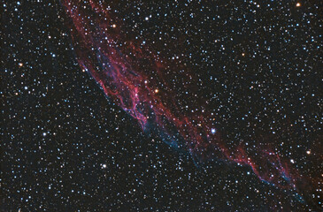 The Veil Nebula, a supernova remnant. Cloud  of heated and ionized gas and dust in the...