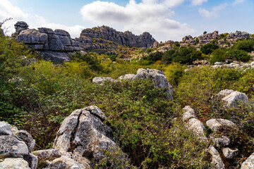 rocks in the mountains with sky and clouds
