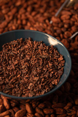 Roasted cocoa beans in a bowl
