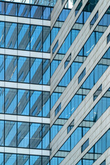 Obraz premium Glass facade of a modern building. Construction and rental housing.