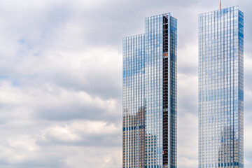 Glass facade of a modern building. Construction and rental housing.