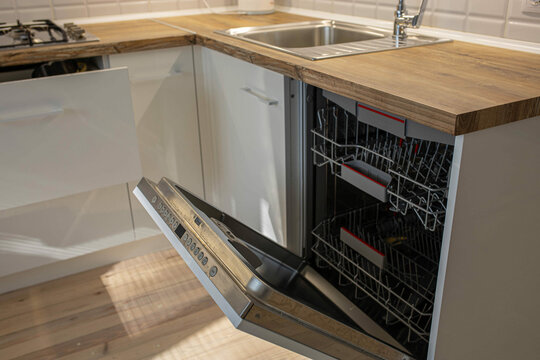 modern dishwasher built-in wood worktop.
