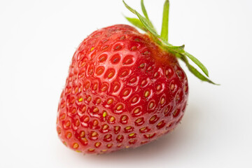 Ripe strawberries on a white background. Red strawberry macro photo