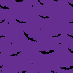 Flying bats seamless Halloween wallpaper or wrapping paper design. Vector illustration.